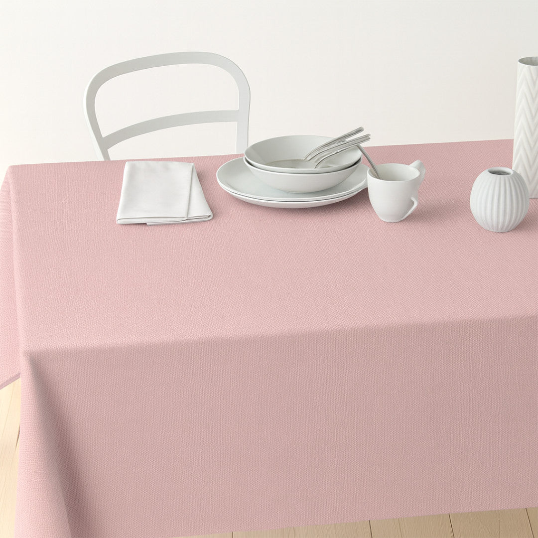 Nordfavn Dean Støvet Rosa – Ensfarget akrylduk i linlook, på bord