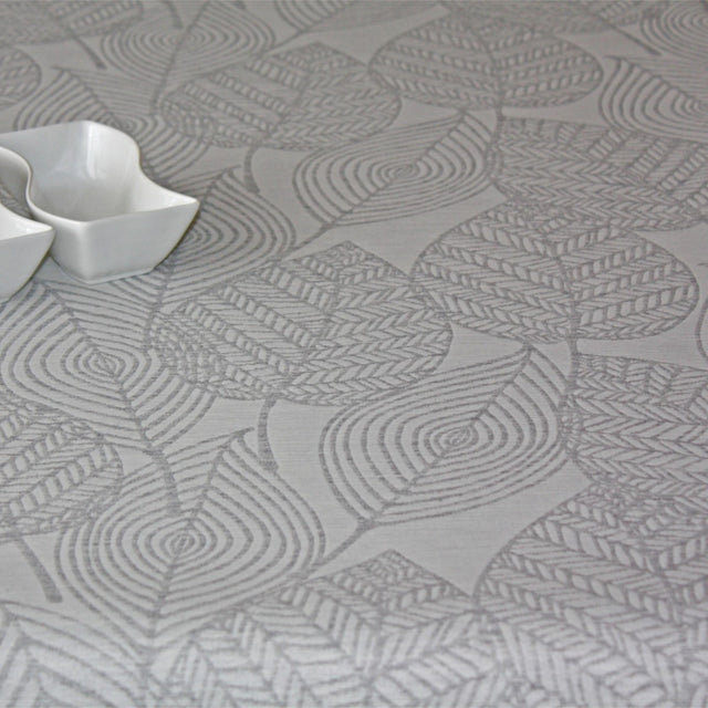 Amberes Jacquard, grå blader. Jacquardvevd akrylduk med grå strekblader på naturfarget bunn