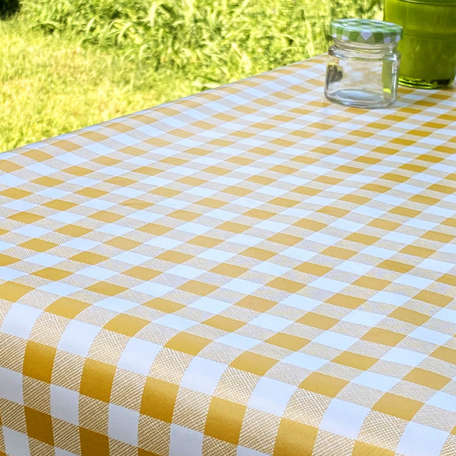 Voksduk med klassiske 1,5 x 1,5 cm ruter – 140 cm bred – gul