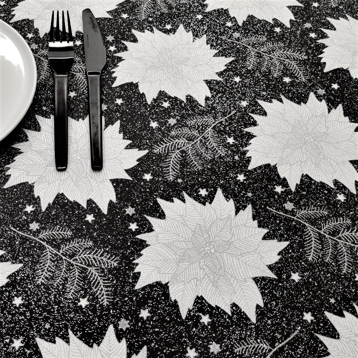 Julestjerne Sort - Juleakrylduk med julestjerner, gran og glitter, 155 cm bred