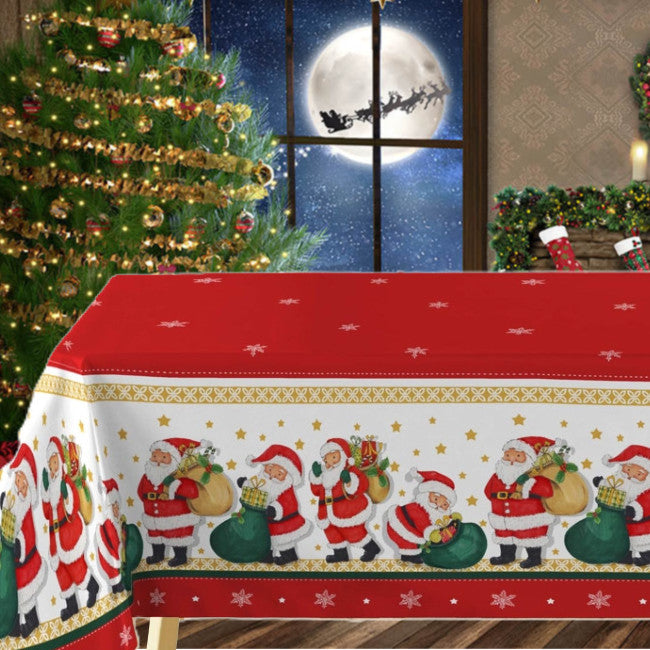 Julenissen med gavene - Rød julevoksduk med julenisser