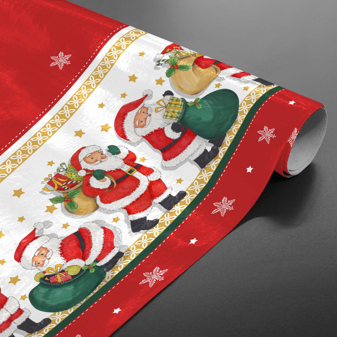 Julenissen med gavene - Rød julevoksduk med julenisser