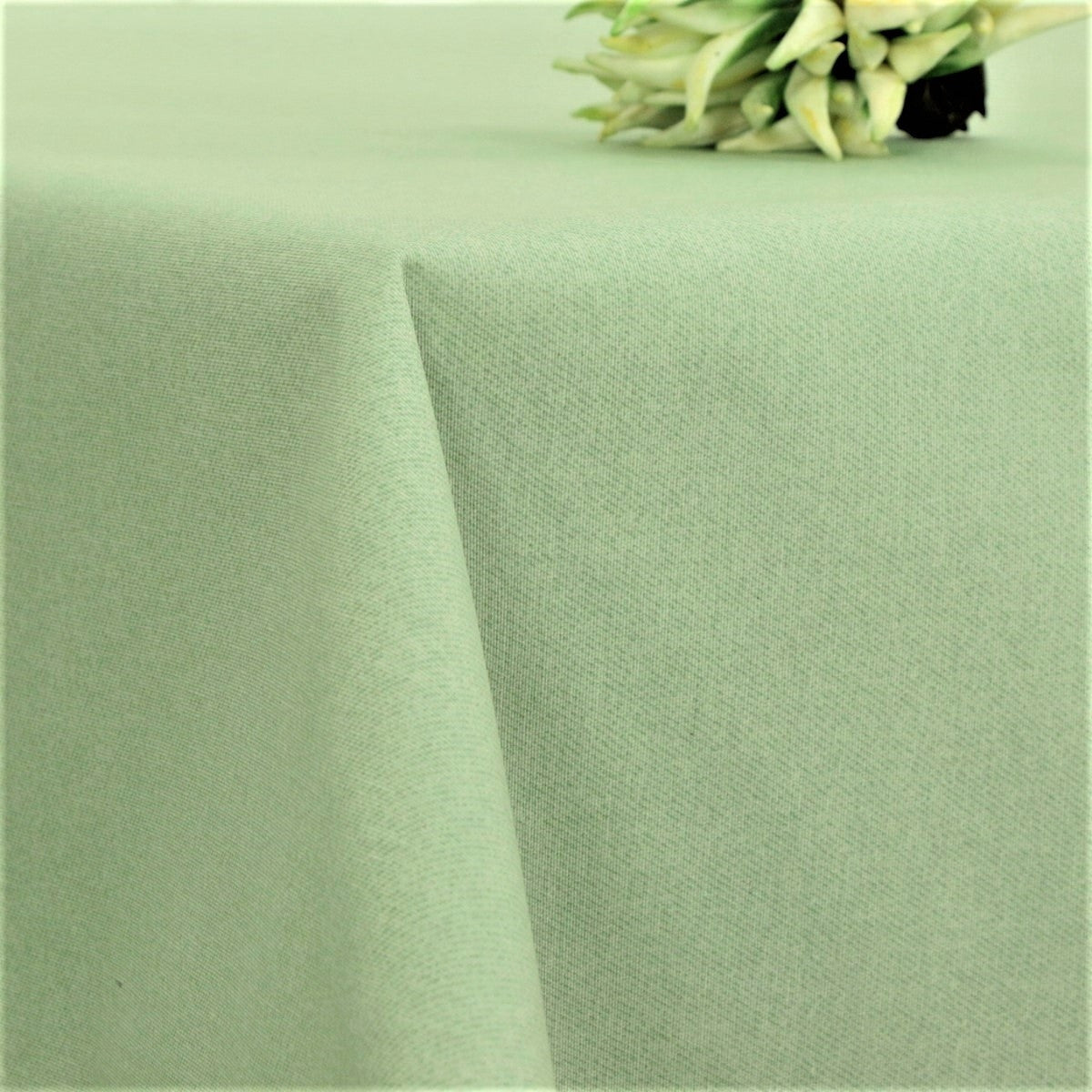 Ensfarget akrylduk i mint - Dali 160 cm bred