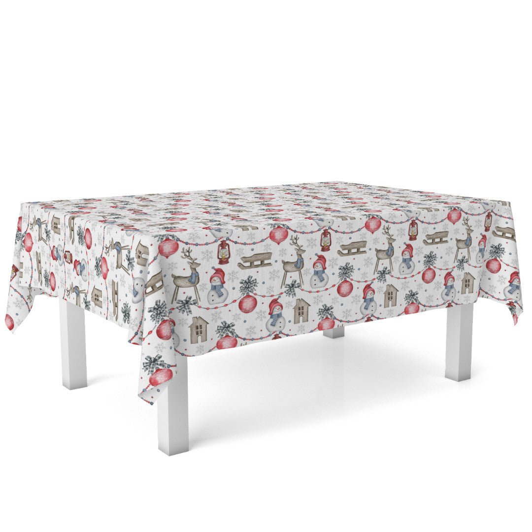 Nieve juleduk med glade snømenn og julemotiver på bord
