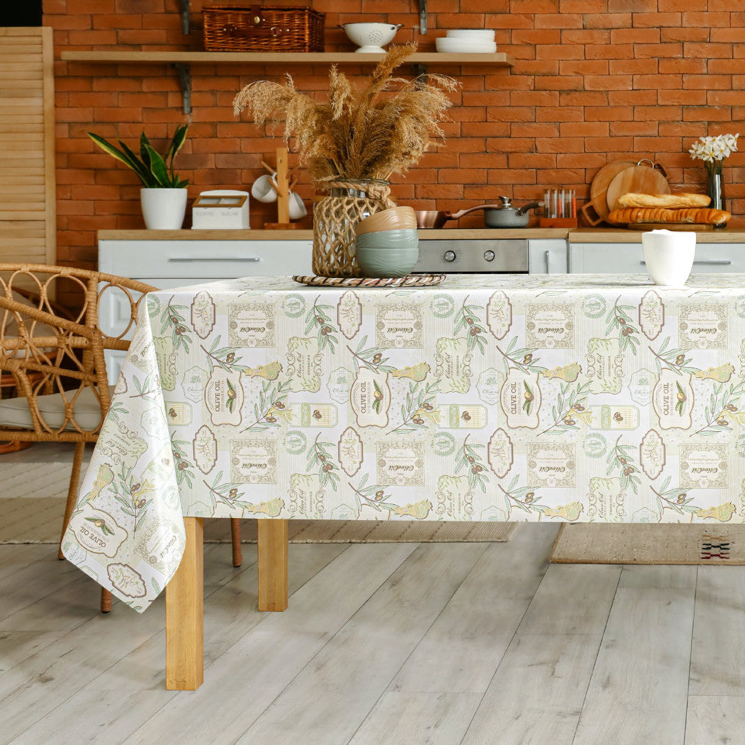 Oliven i pastell – voksduk i lyse pastellfarger med olivenkvister
