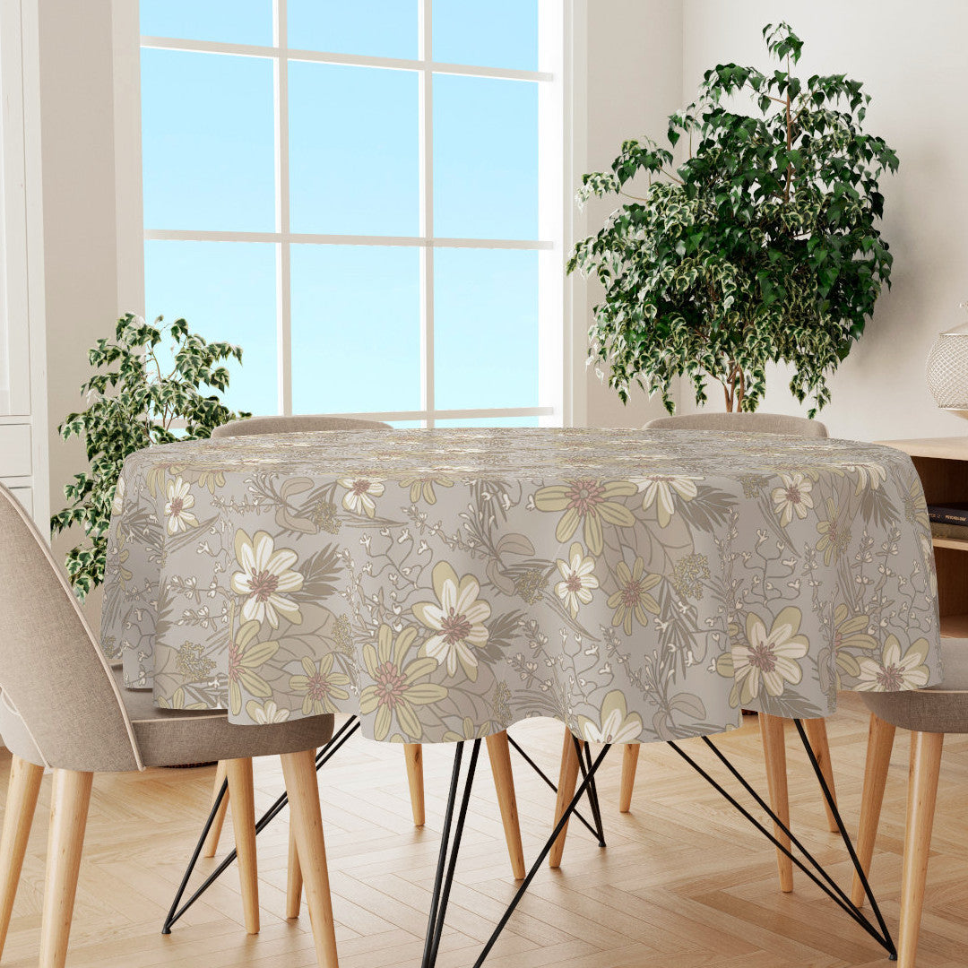 Rund voksduk med blomster og blader i pastellfarger