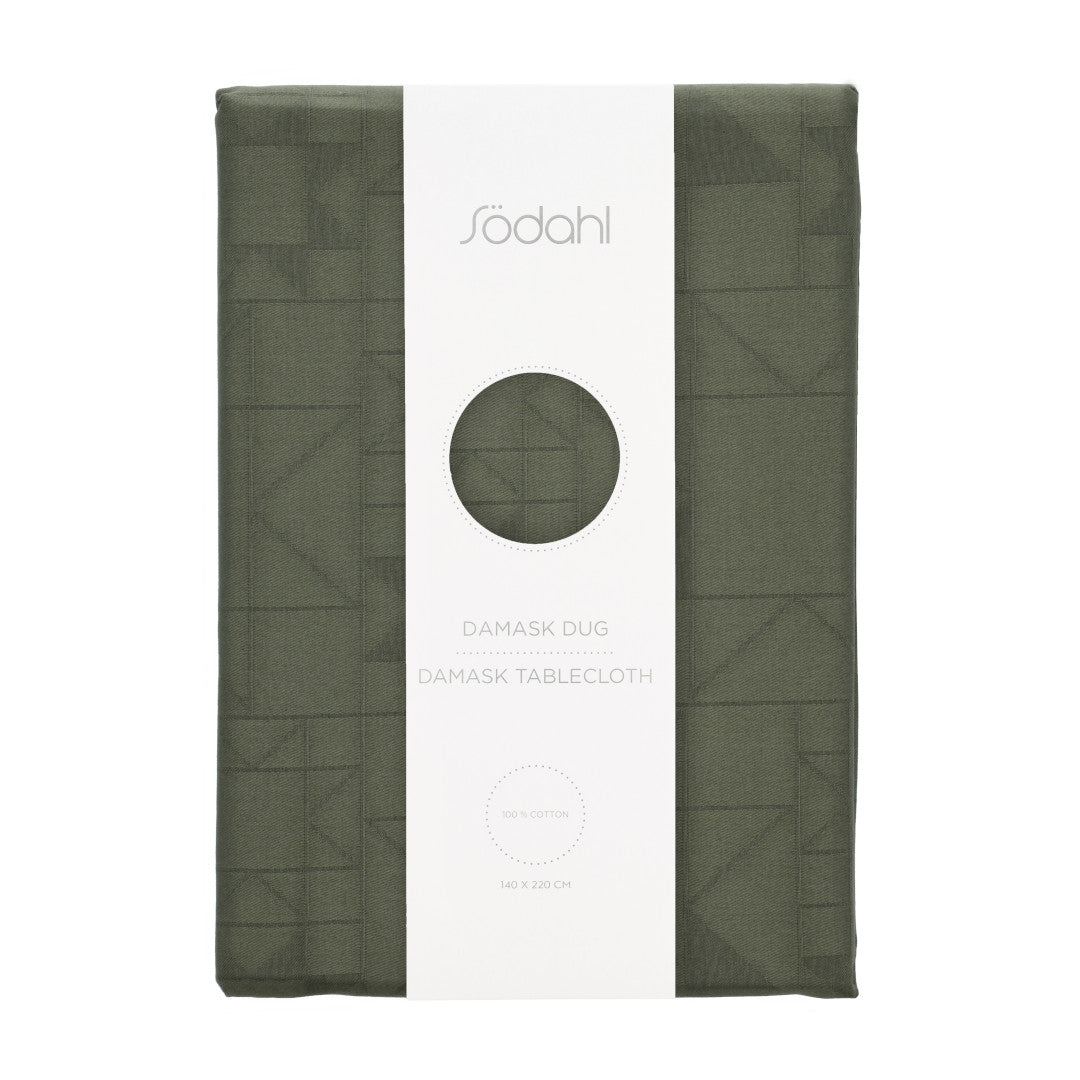 Södahl Star Damask juleduk i grønt, innpakket med elegant bånd og etikett 140x270