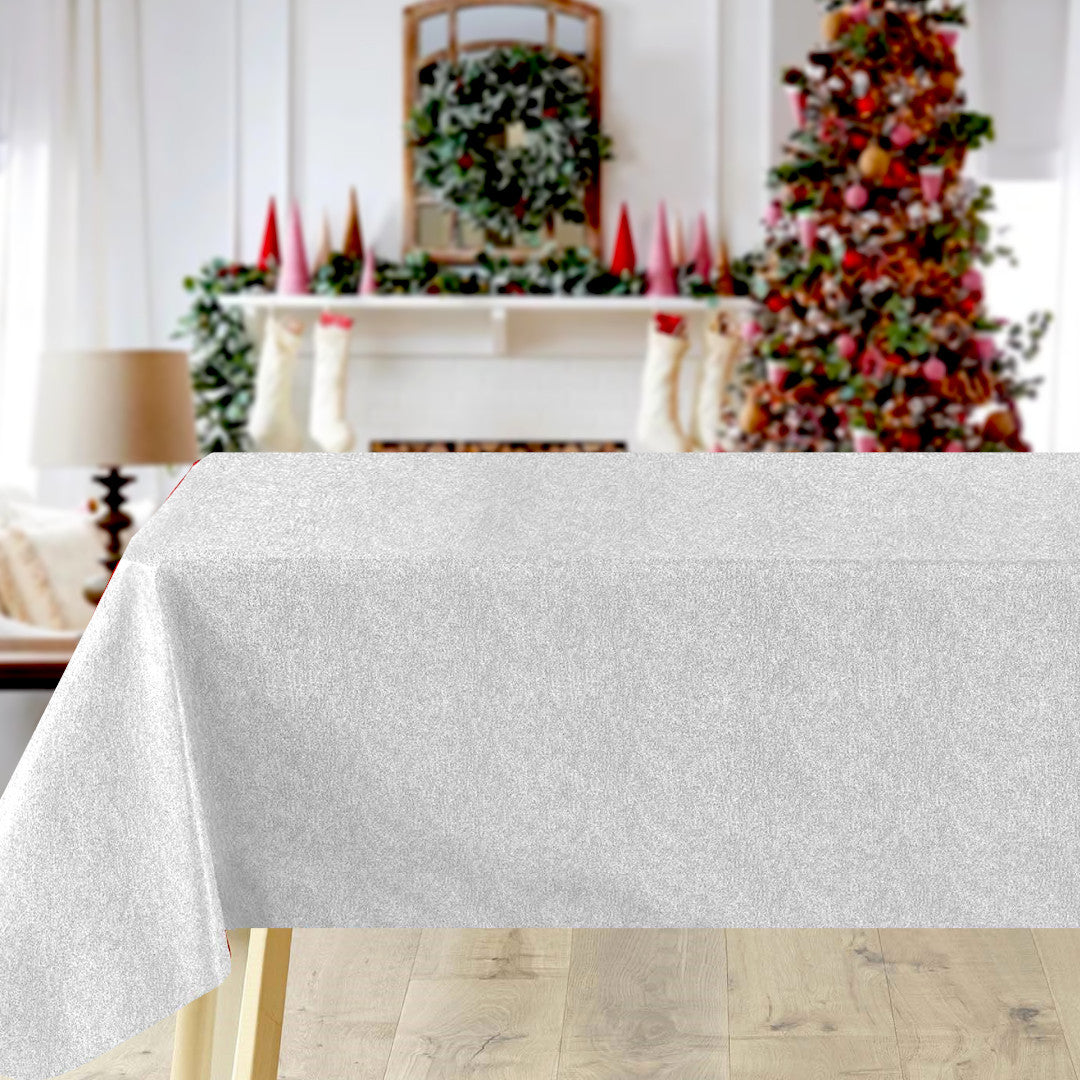 Sølvglans julevoksduk på bord som reflekterer lys med vakker sølveffekt