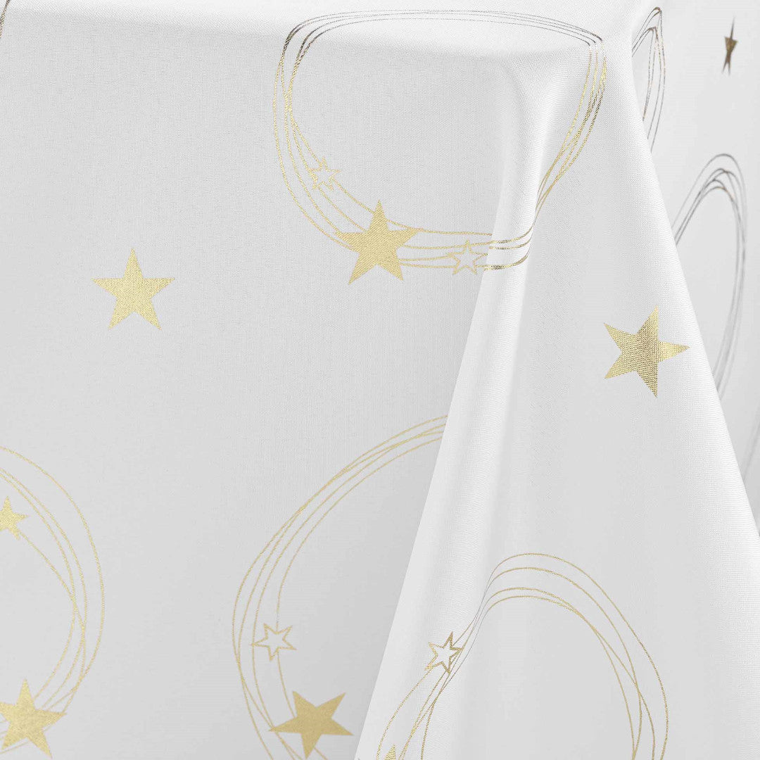 Nærbilde av hjørnet på Star 150 x 240 cm hvit juleduk med gullprint