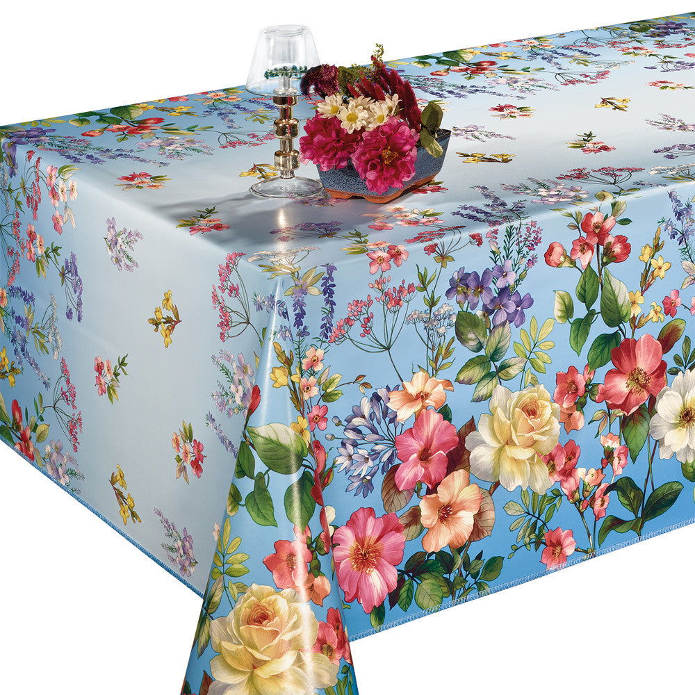 Voksduk – blomsterflor på lyseblå himmel