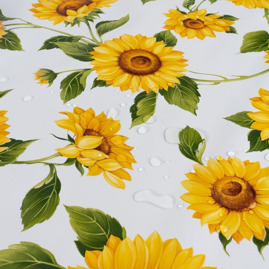Solsikker – voksduk i gule og oransje farger på hvit bunn, 140 cm