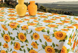 Solsikker – Voksduk i gule og oransje farger på hvit bunn, 160 cm bred