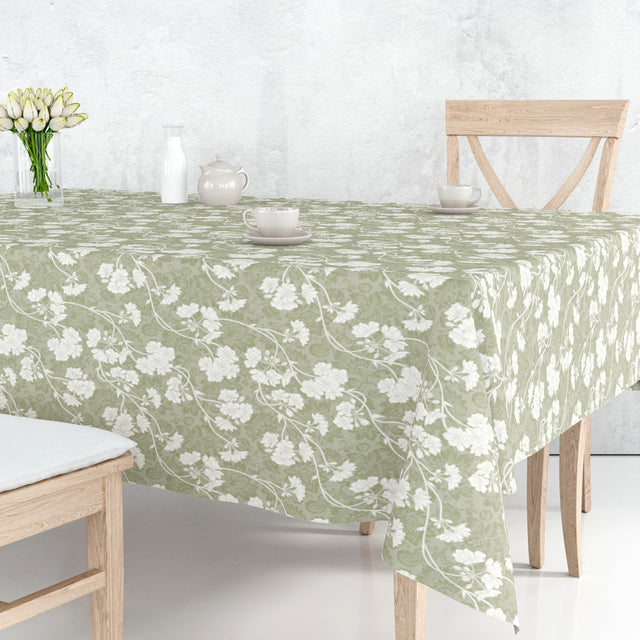 Botanic Green – Lett preget voksduk med blomster