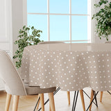 Classic Dot Beige – Rund voksduk med hvite prikker