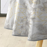 Coconut Metallic – Rund voksduk i grått med gulldetaljer Ø 155 cm kantbånd