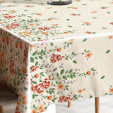 Flora Sand – Preget voksduk med blomsterbord, hjørne