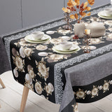 Floria Sort – Dekorativ voksduk med blomsterbord, ende