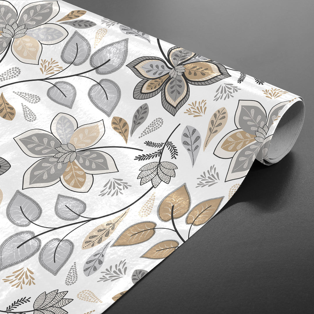 Gloriette – Voksduk med blomster i varme grå og sandfarger, rullet