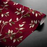 Liane Rouge – Voksduk i burgunder med gyldne bladranker, rullet