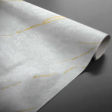 Lustral Metallic – Elegant voksduk med marmorstruktur og gullårer, rullet