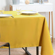 Nelson, ensfarget kvadratisk duk med flekkavvisende behandling 180 x 180 cm – Gul