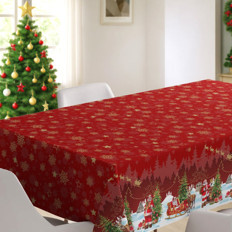 Nisseby – Rød julevoksduk med julenisse og snødekt landskap, julemiljø