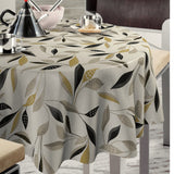 Nordfavn Class Beige – Voksduk med grafisk bladmotiv rund miljø