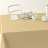 Nordfavn Dean Støvet Okker – Ensfarget akrylduk i linlook, på bord