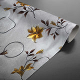 Rullet Altea Metallic Yellow voksduk med sølv og gyldne blomster