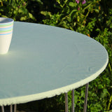 Ensfarget akrylduk i mint - rund akrylduk med strikkant