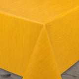 Ensfarget voksduk med preget struktur, 140 cm bred – Gul