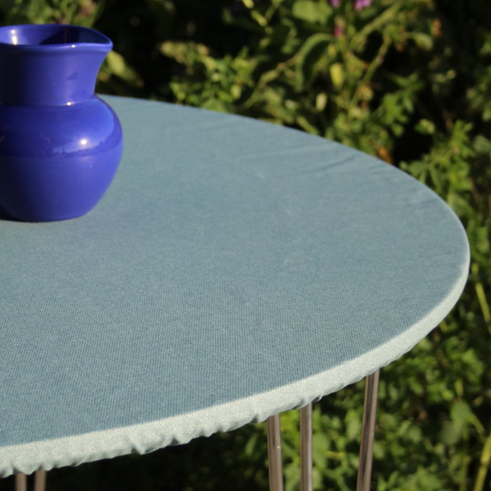 Ensfarget akrylduk i opal - rund akrylduk med strikkant