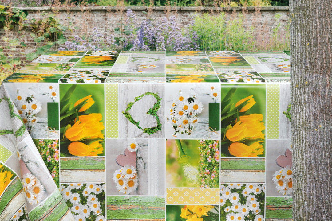 Vår i vente – voksduk med hvite prestekrager, gule tulipaner og påskeliljer