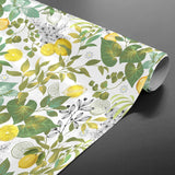 Grace Citrus Garden – Voksduk med sitroner og grønne blader, rullet