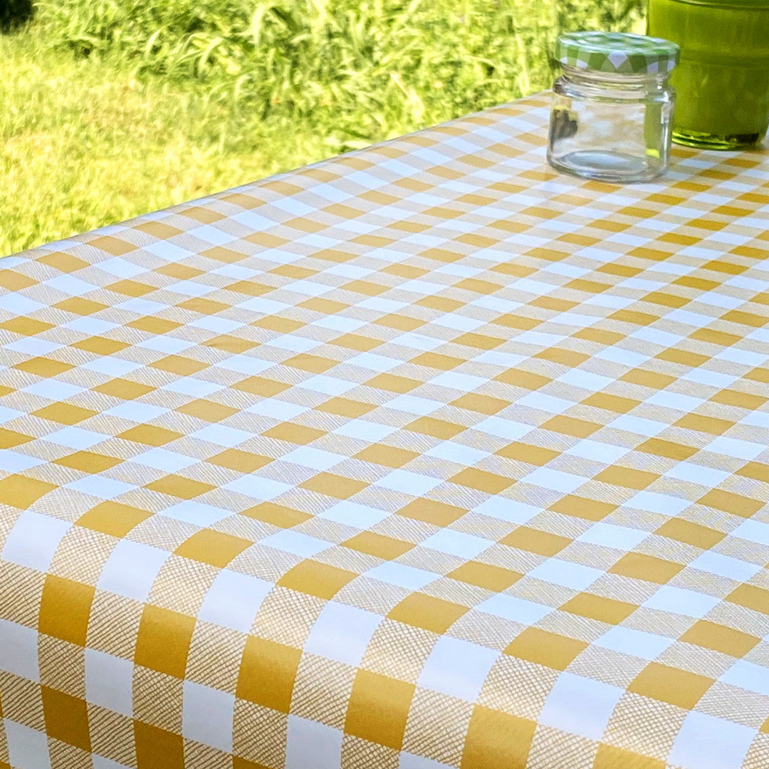 Voksduk med klassiske 1,5 x 1,5 cm ruter – 140 cm bred – gul