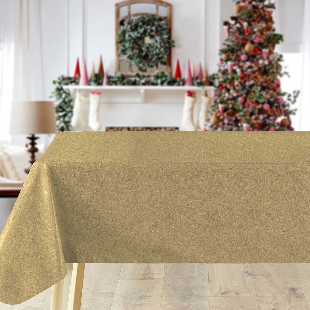 Guldskær – Ensfarget gull julevoksduk i metallook i miljø