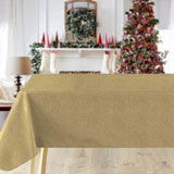 Guldskær – Ensfarget gull julevoksduk i metallook i miljø