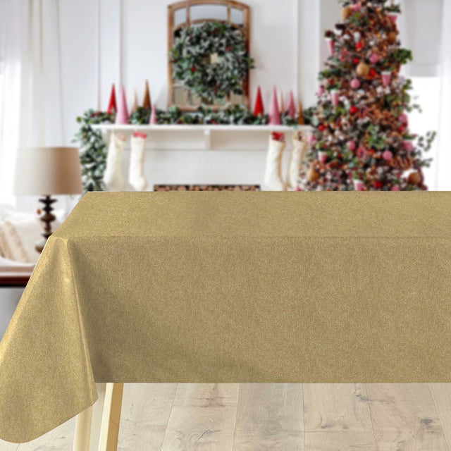 Guldskær – Ensfarget gull julevoksduk i metallook i miljø
