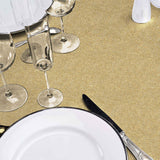 Ensfarget gull julevoksduk i metallook med borddekking