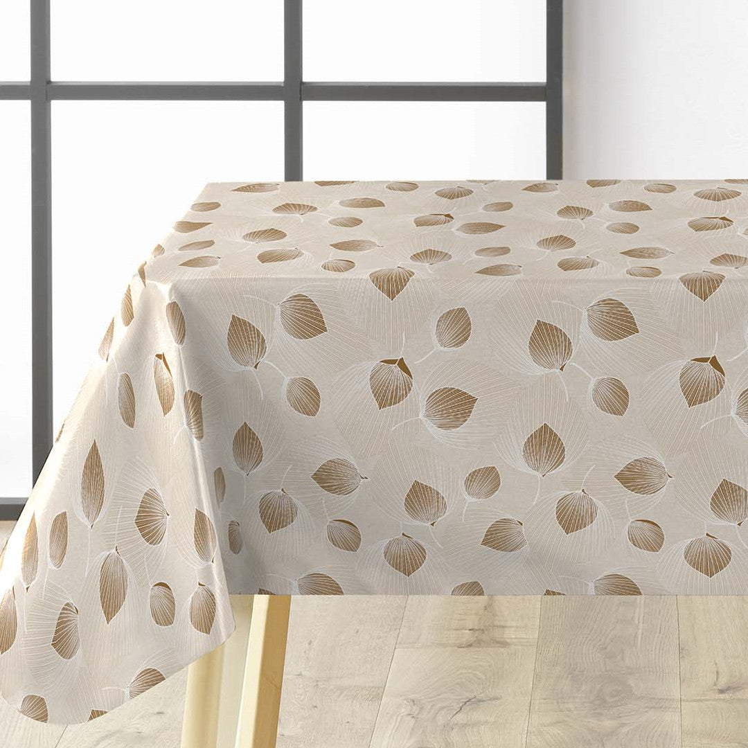 Helga Creme voksduk på bord med elegante blader og kremfarget bunn