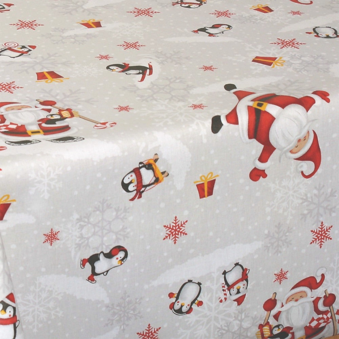 Nærbilde av Julefest på Sydpolen juleduk med pingviner og snøfnugg