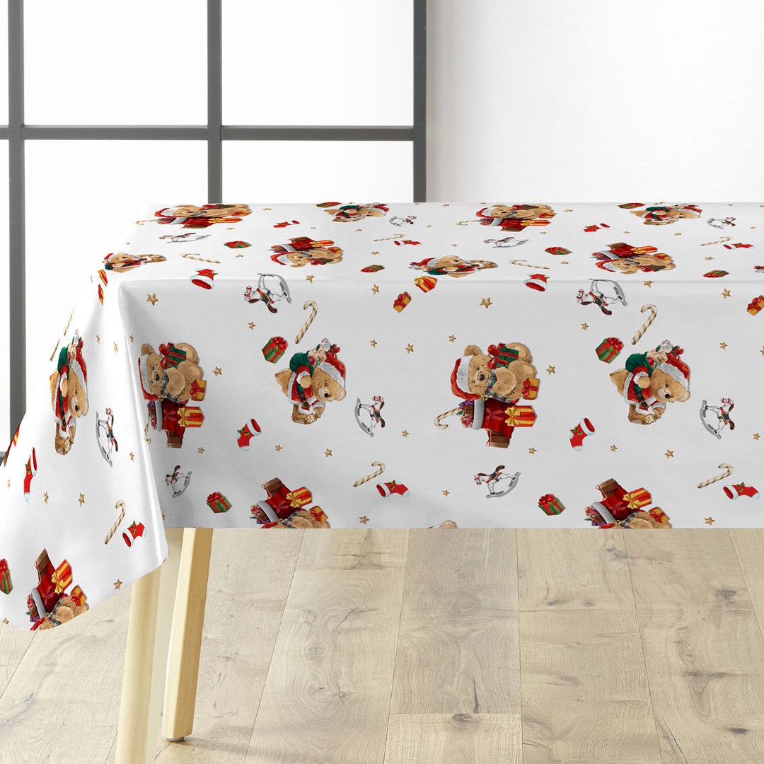 Julevoksduk med bamser og gaver på bordet