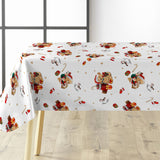 Julevoksduk med bamser og gaver på bordet