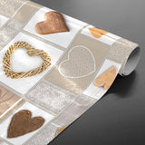 Rullet julevoksduk med naturfargede hjerter og mønstre