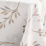 Nærbilde av Manola Natural-dukens bladmønster og tekstur i beige og brunt