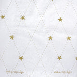 Medusa Stardust Gold tekstilduk med antiskli, vakker juleduk med gullstjerner, 140 cm bred