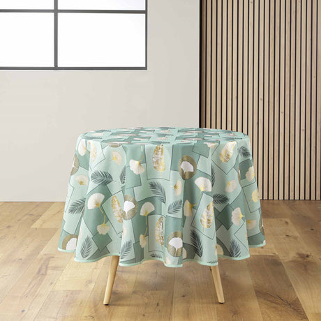 Natane Sage rund duk med bladmønster i gull og grått på lys bakgrunn