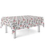 Nieve juleduk med glade snømenn og julemotiver på bord