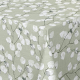 Nærbilde av hjørnet på Nova Green voksduk med sarte hvite blader