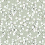 Mønsteret på Nova Green voksduk med elegante grener og hvite blader